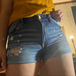 light wash ripped shorts